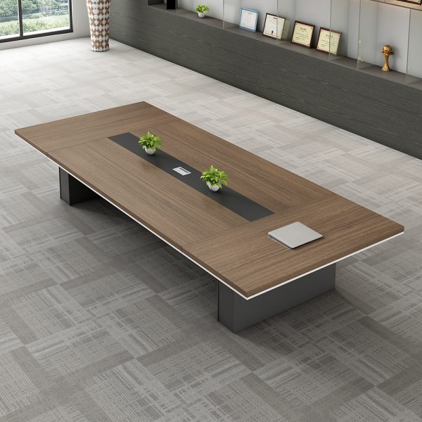 3M Advanced Modern Office Conference Table Create a professional and collaborative meeting space with the 3M Advanced Modern Office Conference Table. Built for modern offices, this table combines sleek design, durability, and practicality to support effective teamwork and decision-making. Spacious and Functional Design With its 3-meter length, the table comfortably accommodates 10–12 people, making it ideal for boardroom meetings, client presentations, and team discussions. The elongated rectangular shape ensures clear sightlines, while the generous surface provides ample space for laptops, documents, and other essentials. Premium Craftsmanship Crafted from high-quality engineered wood with a scratch- and stain-resistant finish, the table is designed for long-lasting use. Its sturdy base ensures stability, even in high-traffic office settings. The clean, modern lines and professional finish complement a wide range of office interiors. Designed for Productivity The advanced design includes integrated cable management to keep wires neat and hidden, ensuring a clutter-free workspace. This feature makes the table perfect for connecting projectors, laptops, and video conferencing systems without distraction. Versatile Office Solution Whether used in corporate boardrooms, executive offices, or collaborative workspaces, this conference table supports both formal and informal settings. Its modern appeal adds authority to important meetings while fostering an atmosphere of collaboration and focus. Easy Maintenance The smooth surface is simple to clean, maintaining its polished look with minimal effort. Resistant to everyday wear, the table retains its professional finish for years. Key Features: 3M length, seating 10–12 people. Premium engineered wood with durable finish. Sleek, modern design for executive settings. Integrated cable management for organized meetings. Scratch- and stain-resistant surface. The 3M Advanced Modern Office Conference Table is more than just furniture—it is a statement piece that reflects professionalism and efficiency. Durable, stylish, and functional, it is an investment that enhances both your workspace and the way your team collaborates.