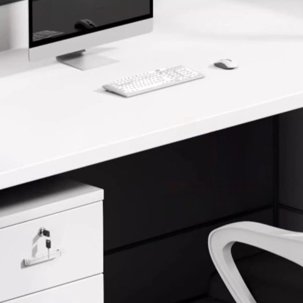 Office Four-Seater Staff Workstation Modern and Functional Design The Office Four-Seater Staff Workstation is designed to create a collaborative and efficient working environment. With its clean lines and contemporary finish, it adds a professional look to any office space. Space-Saving and Practical Layout This workstation comfortably accommodates four employees in a compact footprint. Each seat has a dedicated workspace with enough room for computers, files, and personal items. The design helps maximize office space while keeping desks organized and clutter-free. Durable and Long-Lasting Build Constructed from high-quality engineered wood or laminated surfaces, the workstation ensures durability and strength. Sturdy frames and solid partitions provide stability and privacy for daily office use. The scratch-resistant finish keeps the workstation looking new even in busy environments. Privacy with Shared Collaboration The workstation comes with partition panels that separate each desk. These panels give employees privacy for focused tasks while still allowing easy communication and teamwork. This balance of collaboration and independence improves productivity across the office. Cable Management Features Built-in cable ports and channels help manage wires neatly. This feature keeps desks free from tangled cords and supports a clean, professional appearance. It also allows employees to connect laptops, monitors, and other devices with ease. Versatile for Any Workplace The Office Four-Seater Staff Workstation is ideal for startups, call centers, and corporate offices. Its neutral finish matches various office themes, whether modern or traditional. The layout can also be adjusted to fit open-plan or segmented office designs. Invest in Efficiency and Style This workstation is more than just office furniture. It is a smart solution that promotes productivity, teamwork, and comfort. With its durable build and modern design, the Office Four-Seater Staff Workstation is a valuable addition to any workplace.