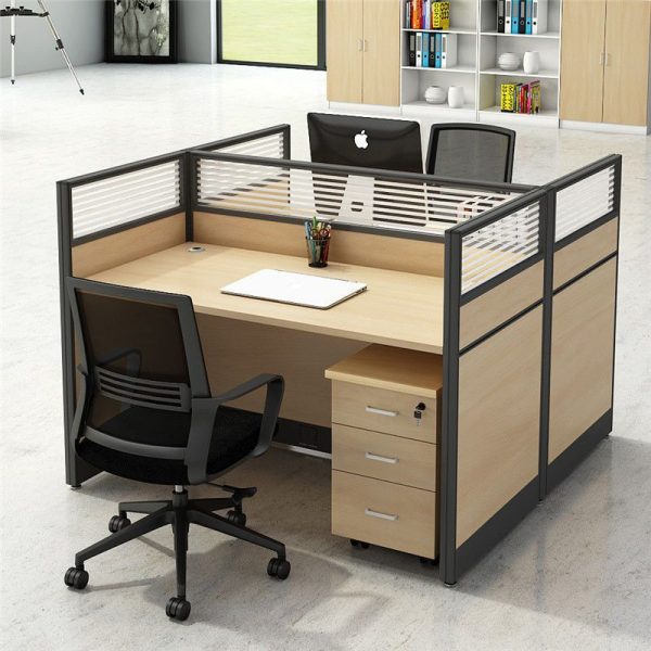Two Way Open-View Office Workstation A Modern Collaborative Workspace The Two Way Open-View Office Workstation is designed to promote teamwork and productivity in modern offices. Not only does it provide a shared space for colleagues, but also it ensures comfort and efficiency throughout the workday. As a result, it is an excellent choice for businesses that value collaboration and open communication. Spacious Two-Person Layout This workstation features a two-way design, offering ample space for two professionals to work side by side. Moreover, its open-view structure allows easy interaction while maintaining personal space. Therefore, it strikes the perfect balance between privacy and collaboration. Durable and Long-Lasting Build Crafted from high-quality steel and engineered wood, the workstation ensures durability and stability. In addition, the strong frame resists wear and tear, making it suitable for daily office use. Consequently, it provides long-term reliability for busy workplaces. Organized and Functional Design The Two Way Open-View Office Workstation includes integrated storage solutions such as drawers, cabinets, or under-desk compartments. Furthermore, its smart design helps keep files, stationery, and personal items organized. As a result, employees can work in a clutter-free environment that enhances focus. Modern and Professional Appearance With its sleek lines and contemporary finish, the workstation complements modern office interiors. Moreover, its open-view layout creates a sense of transparency and unity in the workplace. Therefore, it improves both aesthetics and team dynamics. Customizable for Different Office Needs The workstation can be tailored with various finishes, storage options, and partition heights to meet organizational requirements. In fact, it adapts seamlessly to both small and large office spaces. Thus, it provides flexibility for growing businesses. A Smart Investment for Offices By combining practicality, durability, and style, the Two Way Open-View Office Workstation supports collaboration while maximizing office space. Ultimately, it is a smart investment for companies that value productivity and teamwork.