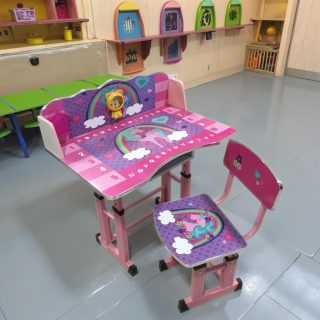 Vibrant Kids' Study Table and Chair Set Fun, Functional, and Designed for Learning The Vibrant Kids' Study Table and Chair Set is thoughtfully designed to create a fun and inspiring learning environment for children. Perfect for study, art, or homework time, this colorful and ergonomic set helps kids stay focused, comfortable, and organized. It’s an ideal addition to any child’s bedroom, playroom, or study corner. Bright and Engaging Design Featuring a cheerful and vibrant color scheme, this study set brings energy and positivity to your child’s space. The playful tones not only make learning more enjoyable but also encourage creativity and concentration. Moreover, the smooth rounded edges ensure safety while maintaining an appealing modern design that complements any interior décor. Ergonomic and Comfortable Setup Both the table and chair are ergonomically crafted to support healthy posture and proper sitting habits. The chair’s curved backrest provides gentle lumbar support, while the table’s height is perfectly suited for young learners. As a result, your child can study or draw comfortably for extended periods without strain. Durable and Child-Friendly Materials Built from high-quality, non-toxic plastic and sturdy metal components, the Vibrant Kids' Study Table and Chair Set ensures long-lasting use and safety. The materials are lightweight yet durable, making the set easy to move while strong enough to withstand daily activities. Additionally, the easy-to-clean surfaces make maintenance effortless for parents. Practical and Organized Design The table features a spacious top for books, notebooks, and stationery, while the under-desk storage compartment keeps supplies neatly tucked away. The smart layout encourages tidiness and helps your child develop organization skills early on. Key Features Vibrant, child-friendly design with bright colors Ergonomic table and chair for proper posture Durable, non-toxic materials for safety and strength Spacious tabletop with convenient storage Lightweight and easy to assemble Inspire Every Learning Moment The Vibrant Kids' Study Table and Chair Set transforms study time into a joyful experience. Combining durability, comfort, and playful design, it’s the perfect solution for nurturing creativity, focus, and learning habits in growing minds.