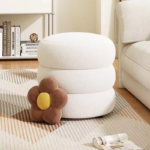 home fabric vanity stool, upholstered vanity seating, fabric dressing table stool, padded makeup vanity stool, cushioned bedroom ottoman, velvet fabric vanity chair, compact vanity bench, modern upholstered footstool, fabric accent vanity seat, small bedroom vanity stool, luxury fabric makeup stool, round fabric vanity stool, upholstered vanity footrest, bouclé fabric vanity seat, comfortable dressing seat, elegant fabric stool with legs, bedroom accent ottoman, tufted fabric vanity stool, chic makeup chair stool, stylish fabric vanity bench