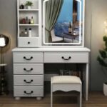Modern Elegant Dressing Table, elegant dressing table, modern dressing table, stylish dressing table, luxury dressing table, contemporary dressing table, bedroom dressing table, modern bedroom vanity, elegant vanity table, luxury vanity desk, makeup dressing table, makeup vanity table, bedroom makeup table, ladies dressing table, ladies vanity table, women's dressing table, cosmetic dressing table, beauty vanity table, personal grooming table, bedroom beauty station, modern makeup station, stylish vanity desk, premium dressing table, affordable dressing table, quality dressing table, beautiful dressing table, classic dressing table, minimalist dressing table, modern wooden dressing table, wooden vanity table, wooden makeup table, modern bedroom furniture, bedroom furniture Kenya, dressing table Kenya, vanity table Kenya, makeup table Kenya, dressing table Nairobi, vanity table Nairobi, makeup table Nairobi, elegant bedroom furniture, luxury bedroom furniture, contemporary bedroom furniture, stylish bedroom furniture, modern home furniture, bedroom furniture shop Kenya, dressing table shop Kenya, vanity furniture Kenya, makeup furniture Kenya, bedroom vanity furniture, modern dressing unit, bedroom dressing unit, ladies bedroom furniture, modern ladies dressing table, luxury ladies dressing table, compact dressing table, small dressing table, large dressing table, spacious dressing table, narrow dressing table, wide dressing table, dressing table with mirror, vanity table with mirror, makeup table with mirror, dressing table with drawers, vanity table with drawers, makeup table with drawers, dressing table with storage, vanity table with storage, makeup table with storage, dressing table with stool, vanity table with stool, makeup table with stool, dressing table set, vanity set, makeup vanity set, bedroom vanity set, modern dressing table set, luxury dressing table set, elegant vanity set, dressing table and mirror, dressing table and chair, dressing table and stool set, mirror dressing table, LED dressing table, dressing table with LED mirror, illuminated vanity table, LED makeup vanity, Hollywood dressing table, Hollywood vanity table, Hollywood makeup station, lighted dressing table, mirror vanity desk, large mirror dressing table, round mirror dressing table, rectangular mirror dressing table, oval mirror vanity, modern mirror vanity, bedroom mirror table, vanity mirror with lights, makeup mirror table, dressing table with shelves, vanity table with shelves, makeup table with shelves, dressing table with cabinet, vanity table with cabinet, makeup table with cabinet, multi drawer dressing table, multiple storage dressing table, spacious vanity table, organized makeup table, makeup storage table, cosmetic storage vanity, beauty product organizer table, jewelry storage dressing table, dressing table with jewelry storage, vanity with jewelry drawers, modern cosmetic table, stylish cosmetic desk, bedroom cosmetic station, makeup organizer table, beauty accessories table, skincare vanity table, skincare station, grooming vanity table, personal care table, modern grooming station, feminine bedroom furniture, chic dressing table, sophisticated dressing table, designer dressing table, designer vanity table, premium vanity furniture, high end dressing table, upscale dressing table, elegant makeup station, modern beauty vanity, luxury makeup station, fashionable dressing table, trendy dressing table, modern vanity furniture, classic vanity furniture, Scandinavian dressing table, minimalist vanity table, modern minimalist dressing table, sleek dressing table, contemporary vanity desk, simple dressing table, functional dressing table, practical vanity table, space saving dressing table, compact vanity desk, small bedroom vanity, apartment dressing table, modern apartment furniture, bedroom storage vanity, multifunctional dressing table, multipurpose vanity table, durable dressing table, sturdy dressing table, strong wooden vanity, quality wooden dressing table, smooth finish dressing table, polished dressing table, glossy dressing table, matte finish vanity, white dressing table, black dressing table, brown dressing table, cream dressing table, grey dressing table, beige dressing table, oak dressing table, walnut dressing table, mahogany dressing table, natural wood dressing table, white vanity table, black vanity table, brown vanity table, grey vanity table, cream vanity table, gold accent dressing table, modern white vanity, modern black vanity, wooden bedroom vanity, elegant white dressing table, luxury white vanity table, modern brown dressing table, contemporary wooden vanity, dressing table for bedroom, dressing table for ladies, dressing table for women, dressing table for girls, dressing table for master bedroom, dressing table for guest bedroom, dressing table for small room, dressing table for apartment, vanity for bedroom, vanity for master bedroom, vanity for guest room, makeup table for bedroom, makeup station for bedroom, bedroom furniture set, modern bedroom set, luxury bedroom set, stylish bedroom set, matching bedroom furniture, modern home decor furniture, bedroom interior furniture, home interior dressing table, interior design vanity table, bedroom decor table, elegant bedroom decor, modern bedroom decor, luxury bedroom decor, vanity room furniture, dressing room furniture, walk in closet vanity, closet dressing table, dressing area table, personal vanity station, home makeup desk, home beauty station, home grooming table, bedroom workstation vanity, multifunctional bedroom table, dressing table with mirror and lights, dressing table with large mirror, dressing table with storage drawers, dressing table with stool and mirror, vanity desk with mirror and lights, vanity desk with drawers, vanity desk with storage, vanity desk with stool, makeup desk with mirror, makeup desk with drawers, makeup desk with storage, cosmetic vanity with mirror, modern ladies vanity desk, elegant women's vanity, luxury women's vanity, stylish makeup desk, premium makeup vanity, contemporary makeup table, modern beauty desk, beauty room vanity, makeup room furniture, dressing room vanity, bedroom dressing station, makeup application table, beauty preparation table, everyday makeup vanity, daily grooming table, modern dressing furniture, elegant vanity furniture, bedroom vanity storage, vanity storage cabinet, dressing table storage unit, makeup storage cabinet, beauty storage furniture, drawer vanity table, cabinet dressing table, shelf vanity table, mirror storage vanity, modern dressing cabinet, bedroom dressing cabinet, elegant dressing cabinet, luxury dressing cabinet, compact vanity cabinet, modern bedroom cabinet, furniture for dressing room, furniture for makeup room, bedroom furniture online Kenya, buy dressing table Kenya, dressing table prices Kenya, affordable vanity table Kenya, modern dressing table price Kenya, luxury dressing table price Kenya, dressing table offers Kenya, dressing table sale Kenya, vanity table offers Kenya, makeup table offers Kenya, dressing table online Kenya, buy vanity table Kenya, buy makeup table Kenya, online furniture shop Kenya, furniture store Kenya, home furniture shop Kenya, bedroom furniture store Kenya, modern furniture shop Kenya, luxury furniture shop Kenya, dressing table supplier Kenya, vanity table supplier Kenya, makeup table supplier Kenya, dressing table dealer Kenya, vanity furniture dealer Kenya, dressing table showroom Kenya, bedroom furniture showroom Kenya, dressing table Mombasa, vanity table Mombasa, makeup table Mombasa, dressing table Kisumu, vanity table Kisumu, makeup table Kisumu, dressing table Nakuru, vanity table Nakuru, makeup table Nakuru, dressing table Eldoret, vanity table Eldoret, makeup table Eldoret, dressing table Thika, vanity table Thika, makeup table Thika, dressing table Kiambu, vanity table Kiambu, makeup table Kiambu, dressing table Ruiru, vanity table Ruiru, makeup table Ruiru, dressing table Kitengela, vanity table Kitengela, makeup table Kitengela, dressing table Athi River, vanity table Athi River, makeup table Athi River, dressing table Machakos, vanity table Machakos, makeup table Machakos, dressing table Nyeri, vanity table Nyeri, makeup table Nyeri, dressing table Meru, vanity table Meru, makeup table Meru, dressing table Nanyuki, vanity table Nanyuki, makeup table Nanyuki, dressing table Naivasha, vanity table Naivasha, makeup table Naivasha, dressing table Kakamega, vanity table Kakamega, makeup table Kakamega, dressing table Bungoma, vanity table Bungoma, makeup table Bungoma, dressing table Kericho, vanity table Kericho, makeup table Kericho, dressing table Kisii, vanity table Kisii, makeup table Kisii, dressing table Migori, vanity table Migori, makeup table Migori, dressing table Homa Bay, vanity table Homa Bay, makeup table Homa Bay, dressing table Malindi, vanity table Malindi, makeup table Malindi, dressing table Kilifi, vanity table Kilifi, makeup table Kilifi, dressing table Diani, vanity table Diani, makeup table Diani, dressing table Ukunda, vanity table Ukunda, makeup table Ukunda, dressing table Lamu, vanity table Lamu, makeup table Lamu, dressing table Garissa, vanity table Garissa, makeup table Garissa, dressing table Isiolo, vanity table Isiolo, makeup table Isiolo, dressing table Marsabit, vanity table Marsabit, makeup table Marsabit, dressing table Embu, vanity table Embu, makeup table Embu, dressing table Murang'a, vanity table Murang'a, makeup table Murang'a, dressing table Karatina, vanity table Karatina, makeup table Karatina, dressing table Kitui, vanity table Kitui, makeup table Kitui, dressing table Makueni, vanity table Makueni, makeup table Makueni, dressing table Voi, vanity table Voi, makeup table Voi, dressing table Taveta, vanity table Taveta, makeup table Taveta, dressing table Busia, vanity table Busia, makeup table Busia, dressing table Siaya, vanity table Siaya, makeup table Siaya, dressing table Bondo, vanity table Bondo, makeup table Bondo, dressing table Webuye, vanity table Webuye, makeup table Webuye, dressing table Mumias, vanity table Mumias, makeup table Mumias, dressing table Kitale, vanity table Kitale, makeup table Kitale, dressing table Kapenguria, vanity table Kapenguria, makeup table Kapenguria, dressing table Lodwar, vanity table Lodwar, makeup table Lodwar, dressing table Wajir, vanity table Wajir, makeup table Wajir, dressing table Mandera, vanity table Mandera, makeup table Mandera, dressing table Kajiado, vanity table Kajiado, makeup table Kajiado, dressing table Ngong, vanity table Ngong, makeup table Ngong, dressing table Karen, vanity table Karen, makeup table Karen, dressing table Langata, vanity table Langata, makeup table Langata, dressing table Westlands, vanity table Westlands, makeup table Westlands, dressing table Kilimani, vanity table Kilimani, makeup table Kilimani, dressing table Kileleshwa, vanity table Kileleshwa, makeup table Kileleshwa, dressing table Lavington, vanity table Lavington, makeup table Lavington, dressing table Runda, vanity table Runda, makeup table Runda, dressing table Muthaiga, vanity table Muthaiga, makeup table Muthaiga, dressing table Parklands, vanity table Parklands, makeup table Parklands, dressing table South B, vanity table South B, makeup table South B, dressing table South C, vanity table South C, makeup table South C, dressing table Embakasi, vanity table Embakasi, makeup table Embakasi, dressing table Kasarani, vanity table Kasarani, makeup table Kasarani, dressing table Roysambu, vanity table Roysambu, makeup table Roysambu, dressing table Zimmerman, vanity table Zimmerman, makeup table Zimmerman, dressing table Kahawa West, vanity table Kahawa West, makeup table Kahawa West, dressing table Githurai, vanity table Githurai, makeup table Githurai, dressing table Umoja, vanity table Umoja, makeup table Umoja, dressing table Donholm, vanity table Donholm, makeup table Donholm, dressing table Buruburu, vanity table Buruburu, makeup table Buruburu, dressing table Komarock, vanity table Komarock, makeup table Komarock, dressing table Ruaka, vanity table Ruaka, makeup table Ruaka, dressing table Juja, vanity table Juja, makeup table Juja, dressing table Syokimau, vanity table Syokimau, makeup table Syokimau, dressing table Mlolongo, vanity table Mlolongo, makeup table Mlolongo, dressing table Kikuyu, vanity table Kikuyu, makeup table Kikuyu, dressing table Limuru, vanity table Limuru, makeup table Limuru, dressing table Gatundu, vanity table Gatundu, makeup table Gatundu, dressing table Gikambura, vanity table Gikambura, makeup table Gikambura, dressing table Kiserian, vanity table Kiserian, makeup table Kiserian, dressing table Ongata Rongai, vanity table Ongata Rongai, makeup table Ongata Rongai, dressing table Nairobi Kenya, vanity table Nairobi Kenya, makeup table Nairobi Kenya, dressing table Mombasa Kenya, vanity table Mombasa Kenya, makeup table Mombasa Kenya, dressing table Kisumu Kenya, vanity table Kisumu Kenya, makeup table Kisumu Kenya, dressing table Nakuru Kenya, vanity table Nakuru Kenya, makeup table Nakuru Kenya, dressing table Eldoret Kenya, vanity table Eldoret Kenya, makeup table Eldoret Kenya, dressing table Thika Kenya, vanity table Thika Kenya, makeup table Thika Kenya, dressing table Kiambu Kenya, vanity table Kiambu Kenya, makeup table Kiambu Kenya, dressing table Ruiru Kenya, vanity table Ruiru Kenya, makeup table Ruiru Kenya, dressing table Kitengela Kenya, vanity table Kitengela Kenya, makeup table Kitengela Kenya, dressing table Machakos Kenya, vanity table Machakos Kenya, makeup table Machakos Kenya, dressing table Nyeri Kenya, vanity table Nyeri Kenya, makeup table Nyeri Kenya, dressing table Meru Kenya, vanity table Meru Kenya, makeup table Meru Kenya, dressing table Naivasha Kenya, vanity table Naivasha Kenya, makeup table Naivasha Kenya, dressing table Kakamega Kenya, vanity table Kakamega Kenya, makeup table Kakamega Kenya, dressing table Malindi Kenya, vanity table Malindi Kenya, makeup table Malindi Kenya, dressing table Kilifi Kenya, vanity table Kilifi Kenya, makeup table Kilifi Kenya, dressing table Kenya price, vanity table Kenya price, makeup table Kenya price, modern elegant dressing table Kenya, luxury bedroom vanity Kenya, stylish makeup vanity Nairobi, elegant dressing table Nairobi, modern vanity table Nairobi, affordable dressing table Nairobi, premium dressing table Nairobi, dressing table with mirror Nairobi, dressing table with drawers Nairobi, dressing table with stool Nairobi, LED vanity table Nairobi, wooden dressing table Nairobi, white dressing table Nairobi, black dressing table Nairobi, bedroom vanity furniture Nairobi, modern bedroom furniture Nairobi, luxury bedroom furniture Nairobi, dressing table delivery Kenya, vanity table delivery Kenya, makeup table delivery Kenya, online dressing table delivery Kenya, modern home furniture Nairobi, elegant home furniture Kenya, quality bedroom furniture Kenya, best dressing table Kenya, best vanity table Kenya, best makeup table Kenya, modern dressing table for sale, elegant vanity for sale, luxury makeup table for sale, bedroom dressing table for sale, dressing table deals Kenya, vanity table deals Kenya, makeup table deals Kenya, contemporary dressing table Kenya, designer vanity Nairobi, modern ladies dressing table Kenya, stylish bedroom vanity Kenya, premium makeup station Kenya, elegant dressing room furniture Kenya, dressing table furniture Nairobi, modern vanity furniture Kenya, makeup vanity furniture Nairobi, bedroom beauty station Kenya, home grooming furniture Kenya, modern dressing table set Nairobi, luxury vanity set Kenya, dressing table with mirror and stool Kenya, dressing table with storage Kenya, compact dressing table Nairobi, small bedroom vanity Kenya, spacious dressing table Kenya, modern wooden vanity Kenya, elegant wooden dressing table Kenya, fashionable dressing table Nairobi, minimalist dressing table Kenya, contemporary vanity table Kenya, modern cosmetic table Kenya, beauty vanity table Nairobi, ladies vanity table Kenya, women's dressing table Nairobi, dressing table shop Nairobi, vanity furniture shop Nairobi, makeup table shop Nairobi, bedroom furniture shop Nairobi, furniture showroom Nairobi, The Furniture Mall Kenya dressing table, Mebri dressing table Kenya, Mebri bedroom furniture, Mebri vanity table, modern elegant vanity furniture, modern elegant bedroom dressing table, stylish bedroom makeup vanity, luxury dressing table with mirror, premium dressing table with drawers, elegant dressing table with stool, modern vanity desk with storage, beautiful bedroom vanity table, functional makeup dressing table, durable wooden vanity table, contemporary ladies dressing table, affordable luxury dressing table Kenya, elegant bedroom furniture Nairobi, modern dressing table online, vanity table online Kenya, makeup vanity online Kenya, dressing table furniture Kenya.